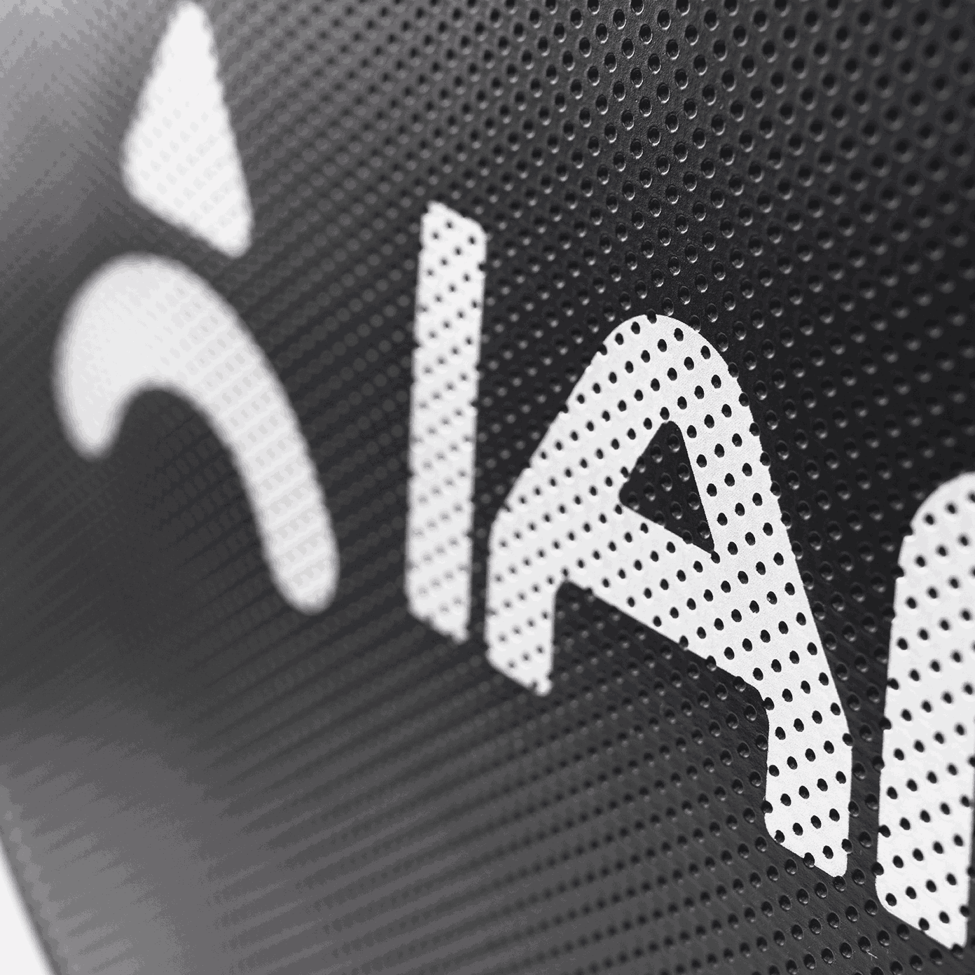 Luxury leather texture on Halcyos IANONI premium padel bag