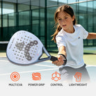 Young padel players holding IANONI Nova Burst rackets at an outdoor court in Qatar
