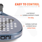 Blue and red Nova Burst junior padel rackets positioned beside a padel court net
